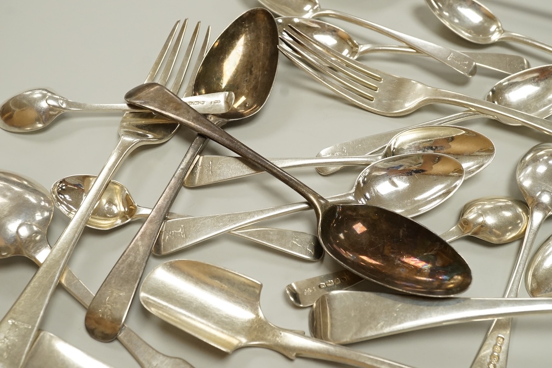 A small quantity of assorted 19th century silver flatware, various patterns, dates and makers, including a set of nine Old English pattern teaspoons, William Chawner II, London, 1833, an Old English pattern basting spoon